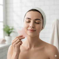 FrostVibe™ quartz gua sha flat lay — handcrafted natural stone skincare ritual accessory — red light therapy gua sha FrostVibe